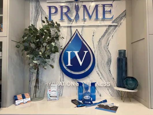 Branded Prime IV Hydration & Wellness reception counter in Montgomery, AL